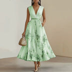 ROWELLA | Flowing Floral Pleated Maxi Dress