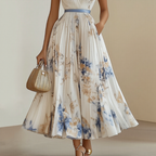 ROWELLA | Flowing Floral Pleated Maxi Dress