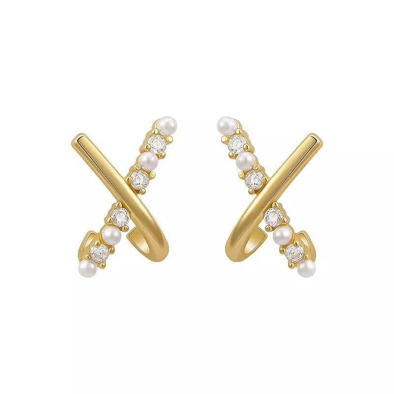 Boucles d'oreilles croisées en perles et strass