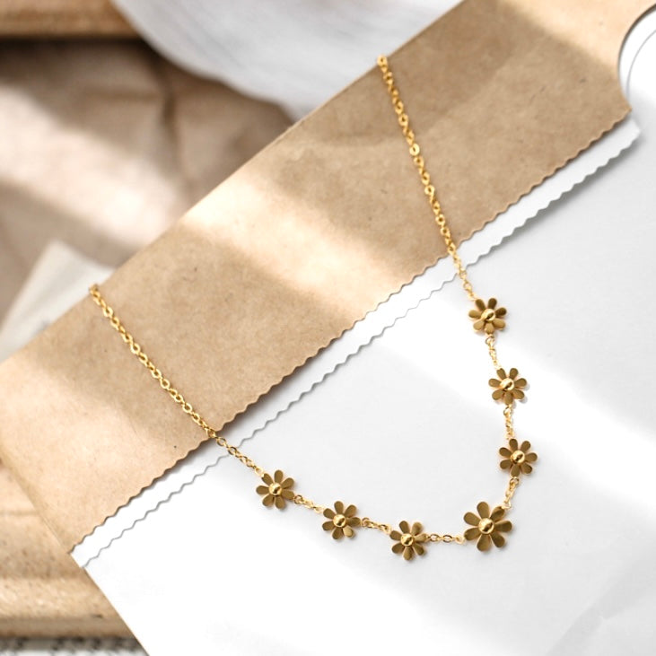 Collier marguerite en acier inoxydable